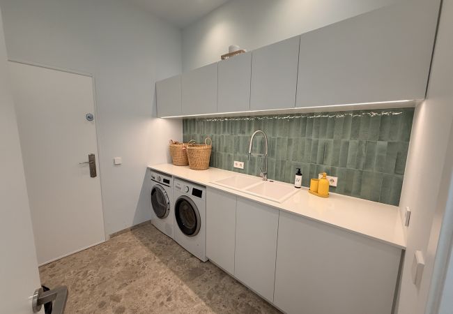 Adamar - Lavanderia en zona de descanso - Planta baja